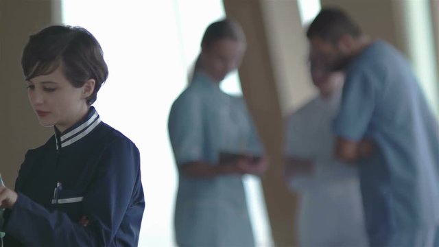 group of medical staff at hospital, doctors team checking patient informations on tablet computer