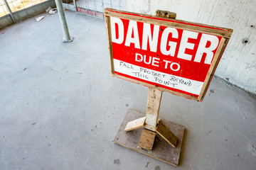 Danger sign on construction site. Danger due to “Fall Protect Beyond this Point