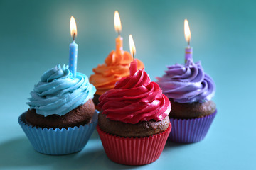 Birthday cupcakes with candles, closeup