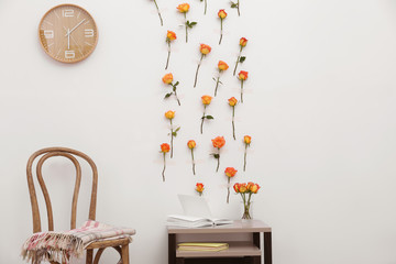 Interior of beautiful living room decorated with flowers