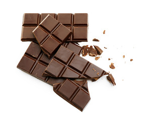 Broken chocolate bar on white background