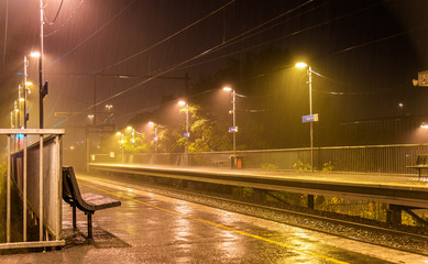 Victoria Park station in the rain at night - Melbourne, Australia