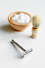 white desktop with tools for shaving beards