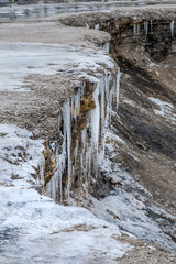 ice created by steam fron nearby guyser at yellowstone