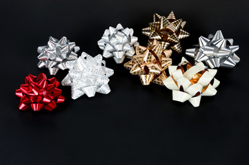 colorful bows isolated on black background