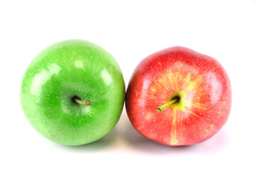 green and red apples on white background