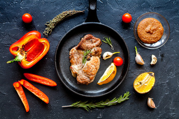 concept cooked steak on dark background top view