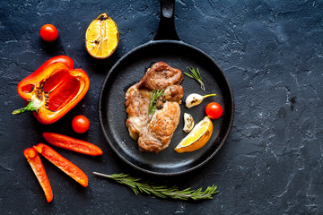 concept cooked steak on dark background top view