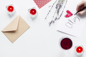 concept of Valentine Day love letter white background top view