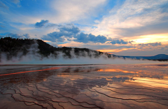 Grand Prismatic Spring at sunset in the Midway Geyser Basin in Yellowstone National Park in Wyoming USA