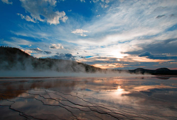 Grand Prismatic Spring at sunset in the Midway Geyser Basin in Yellowstone National Park in Wyoming USA
