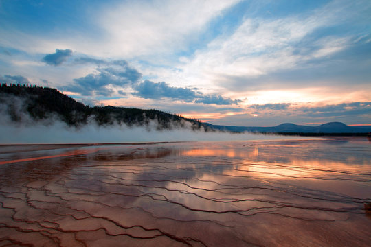 Grand Prismatic Spring at sunset in the Midway Geyser Basin in Yellowstone National Park in Wyoming USA