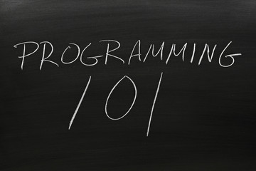 The words "Programming 101" on a blackboard in chalk