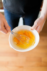 Overhead shot of man scrambling eggs