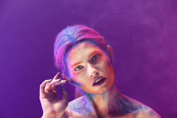 Portrait of sensual young woman with amazing body-art