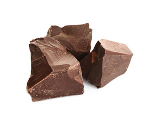 Pieces of tasty chocolate isolated on white