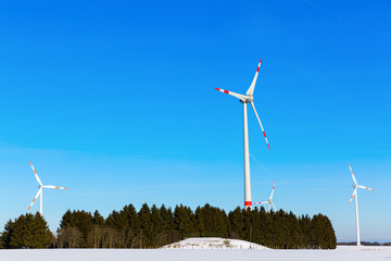 wind turbine against blue sky