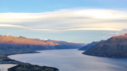 Fototapeta na wymiar Lake Wakatipu flanked by the Remarkables and Bayonet Peaks