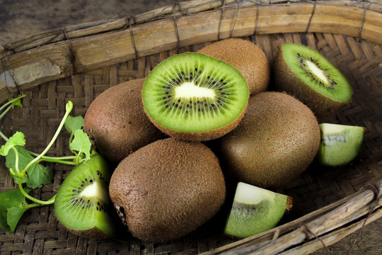 whole and sliced kiwi, healthy food, tropical fruit