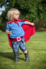Fototapeta premium Superhero Little Boy Imagination Freedom Happiness Concept