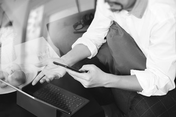 hipster hand using digital tablet docking keyboard and mobile pa