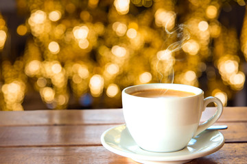 Cup of coffee on wooden table