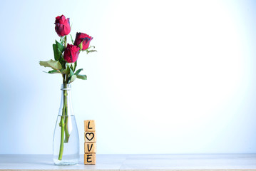  Red rose with heart and wooden alphabet