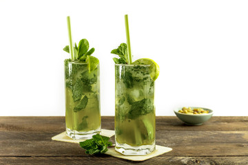 Mojito cocktail with mint leaves and lime