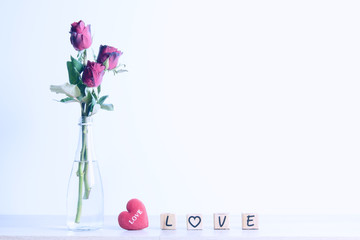  Red rose with heart and wooden alphabet