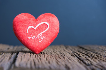 Fototapeta premium Valentines Day background with heart, Red heart on the wooden