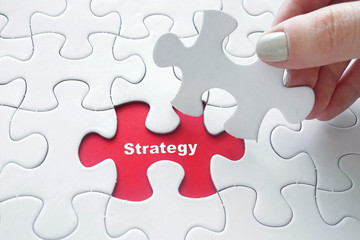 Fototapeta premium Strategy on jigsaw puzzle
