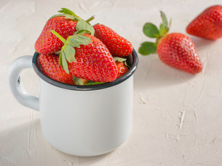 strawberries in wooden bowl