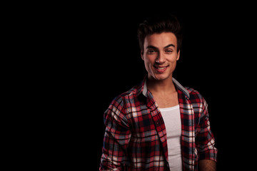 positive young sexy casual man smiling