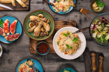 Variety of Italian food on wooden table