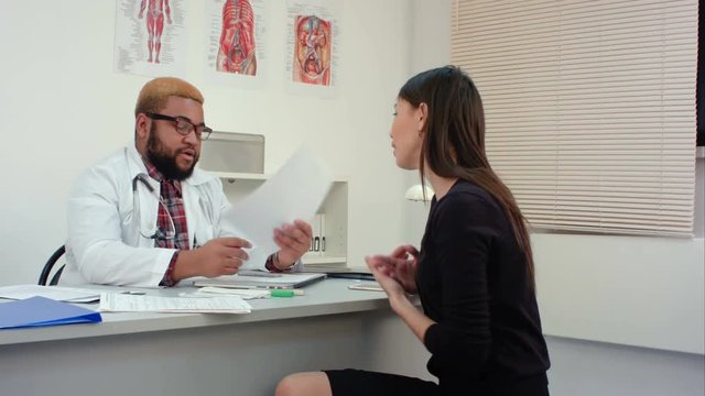 African american doctor can't help his female patient