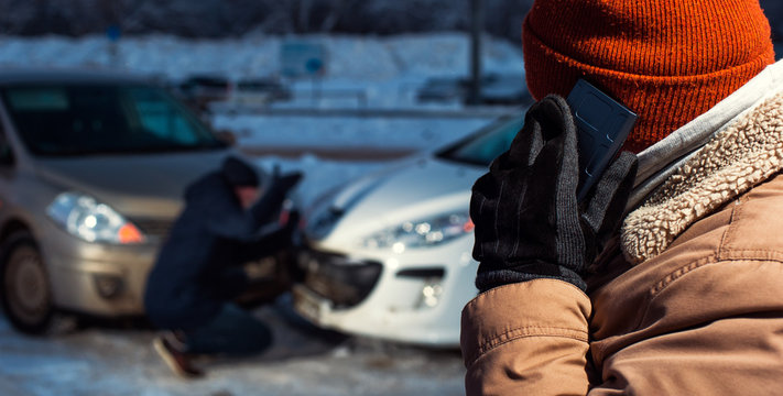 Two Upset Men On Winter City Street