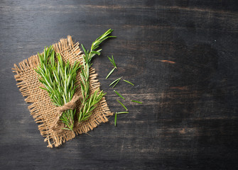 rosemary on a wooden background,top view