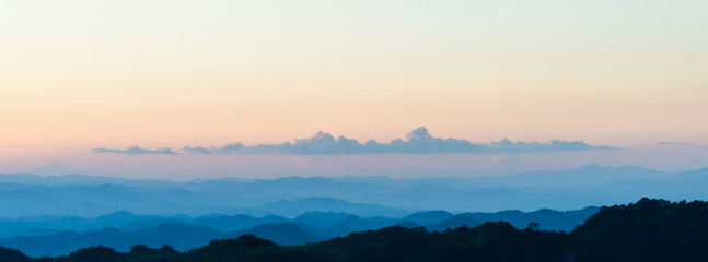 Sunrise sky and misty layer mountain in the morning at sri nan national park thailand