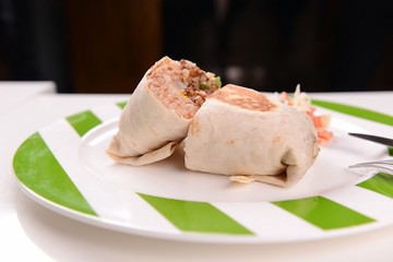 chicken burrito on a plate