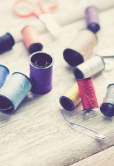 Sewing accessories on wood,vintage tone