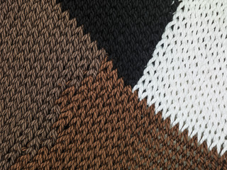 black, brown and white textile fabric