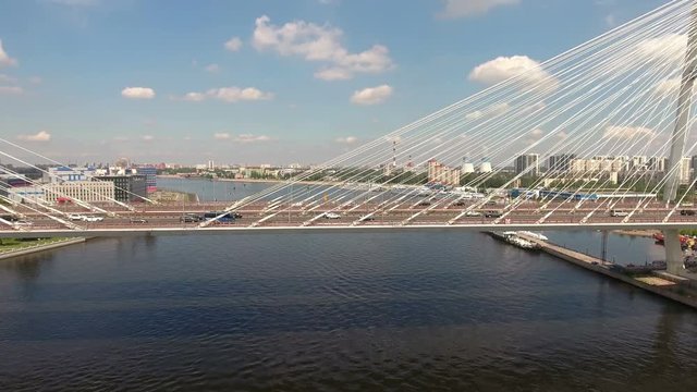 Main span of cable-stayed Bolshoy Obukhovsky Bridge is over Neva river. City ringroad (KAD) is on the bridge. St. Petersburg, Russia
