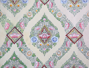 Traditional thai style texture on display at the wall Wat Prakaew  in Bangkok, Thailand.