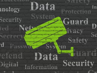 Security concept: Cctv Camera on wall background