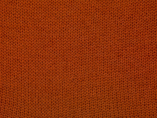 Fototapeta premium red wool sweater, close up background 