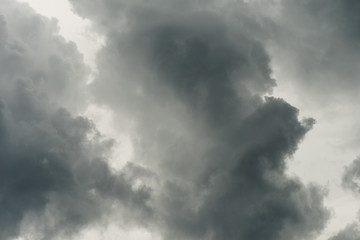 Dark sky and black clouds before rainy, Dramatic black cloud and thunder storm