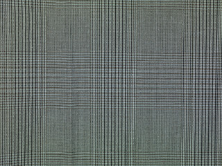 grey checkered fabric background, close up 