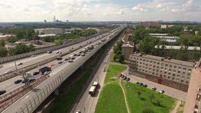 Vehicles riving on ring highway in the Nevsky district, St. Petersburg, Russia. Aerial view
