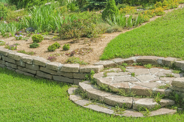 Decorative alpine slide on a green slope