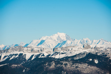 Fototapeta na wymiar beautiful french alps winter panoramic view landscape with Mont Blanc landmark peak in the background